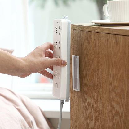 Stylish power strip holder with cables organized