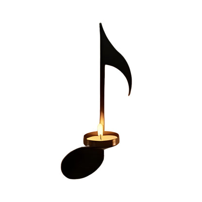 Artistic iron wall-mounted candle holder